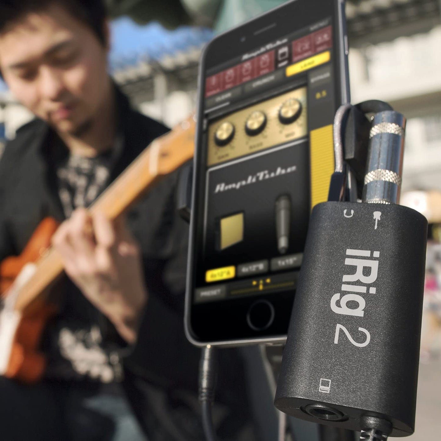 IK Multimedia iRig 2 portable guitar audio interface, lightweight audio adapter for iPhone and iPad with instrument input and headphone/amplfier outs