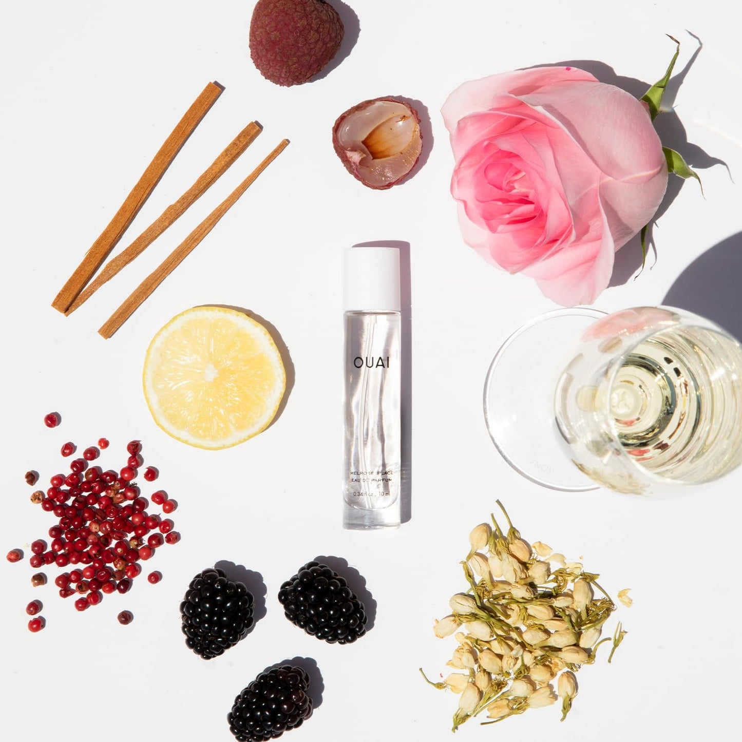 OUAI Mini Melrose Place Eau de Parfum - Elegant Womens Perfume for Everyday Wear - Fresh Floral Scent has Notes of Champagne, Bergamot and Rose with Delicate Hints of Cedarwood and Lychee (.34 Oz)