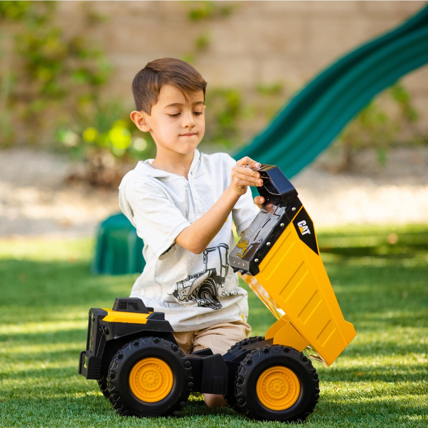 Cat Construction Toys, Cat Mighty Steel Dump Truck 20” - Real Steel Body, Working Dump Bed, Oversize All-Terrain Wheels, Heavy-Duty Construction Vehicle for Indoor & Outdoor Play, Kids Ages 3 +