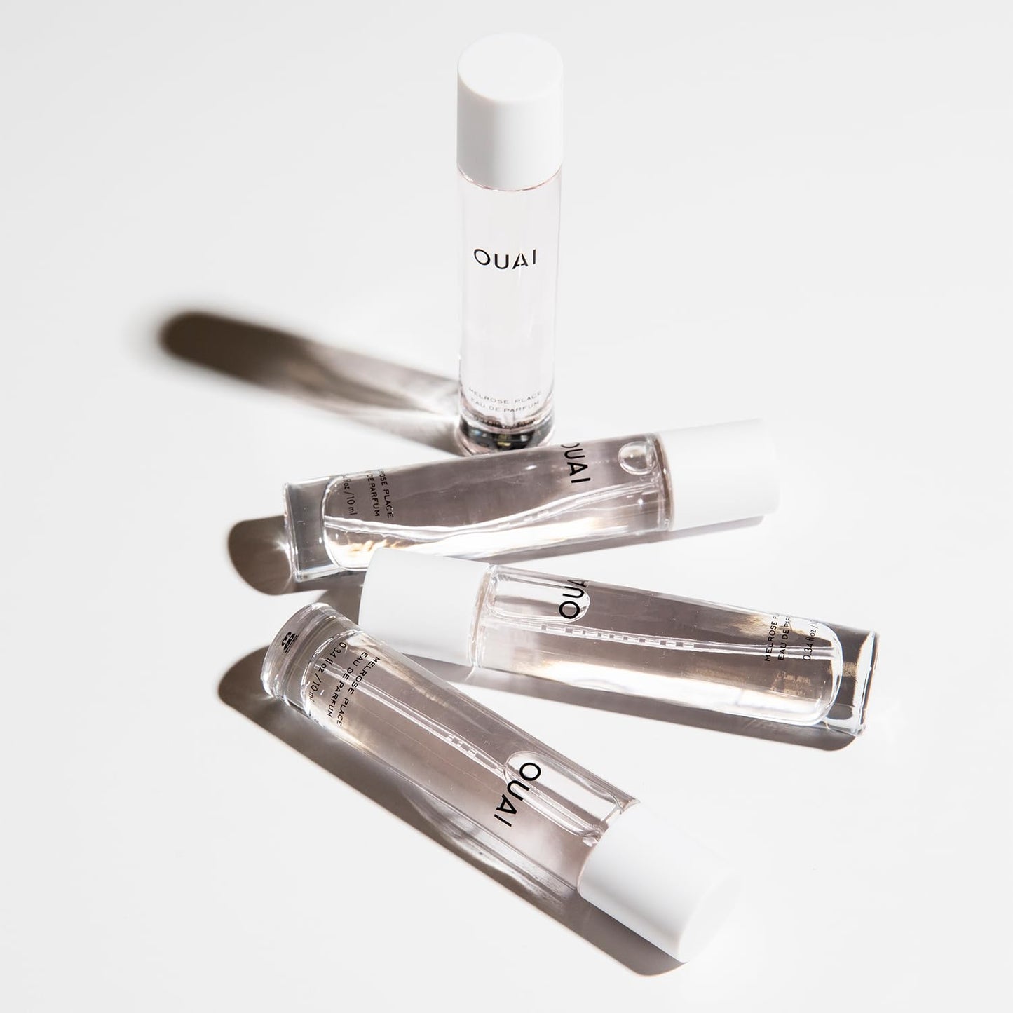 OUAI Mini Melrose Place Eau de Parfum - Elegant Womens Perfume for Everyday Wear - Fresh Floral Scent has Notes of Champagne, Bergamot and Rose with Delicate Hints of Cedarwood and Lychee (.34 Oz)