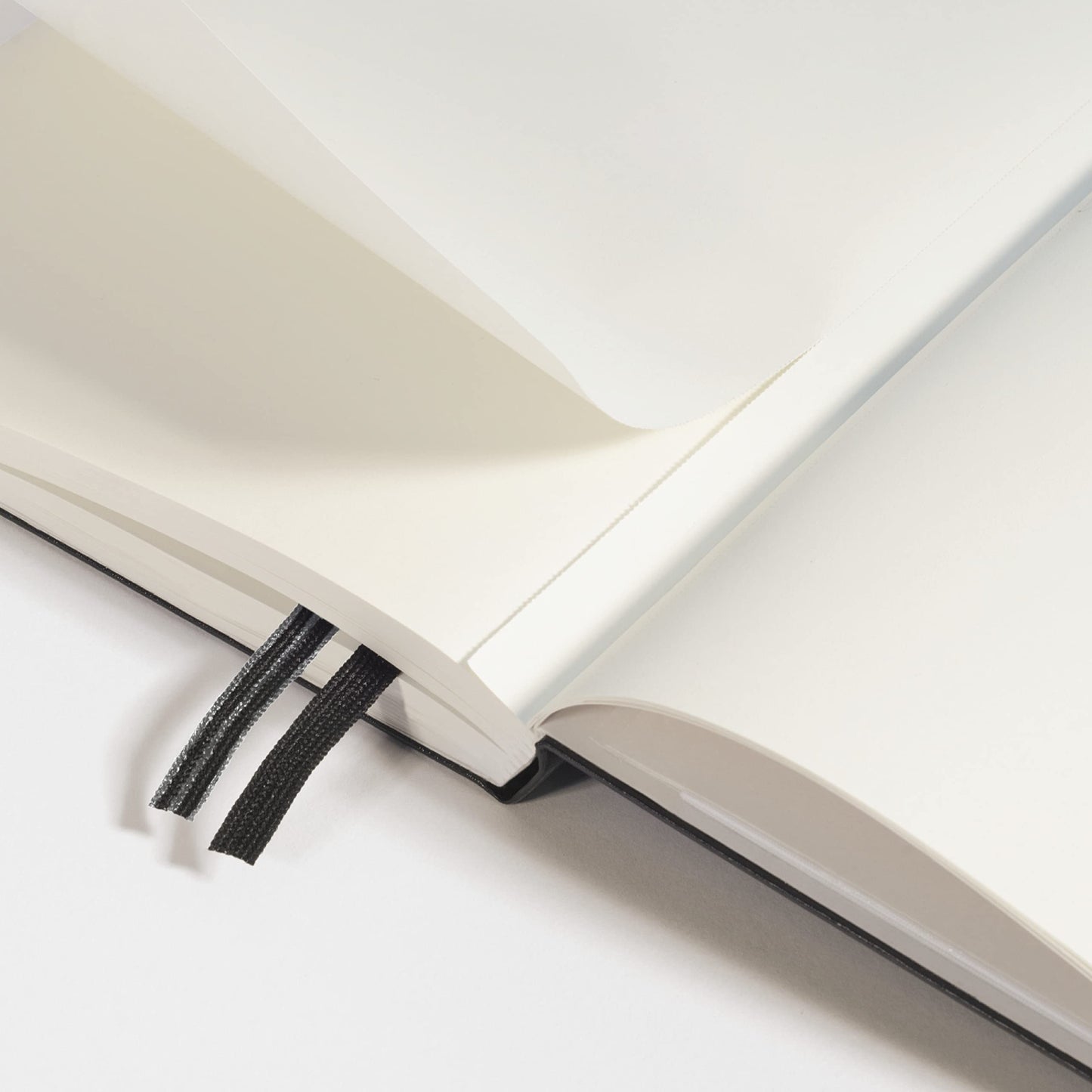 LEUCHTTURM1917 - Notebook Softcover Paperback B6+ - 123 Numbered Pages for Writing and Journaling (Plain, Black)