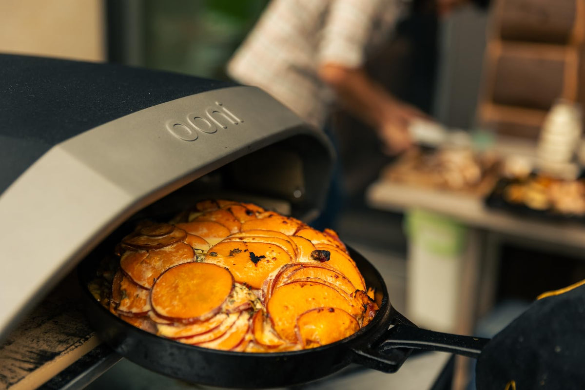 Ooni Cast Iron Skillet Pan - 9" Round Cast Iron Skillet with Removable Handle and Sainless Steel Trivet, Cast Iron Frying Pan, Pre-Seasoned Non-Stick Oven Safe Cookware, Pizza Oven and BBQ Accessories