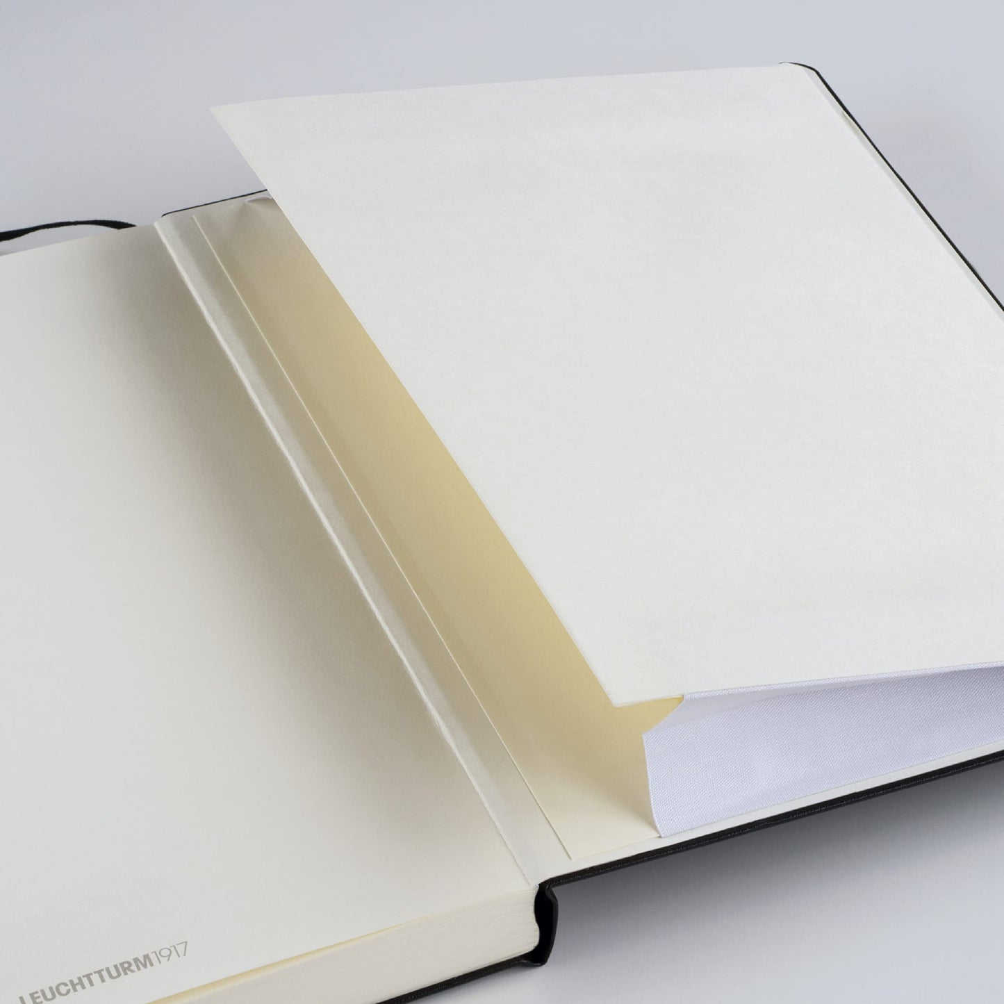 LEUCHTTURM1917 - Notebook Softcover Paperback B6+ - 123 Numbered Pages for Writing and Journaling (Plain, Black)