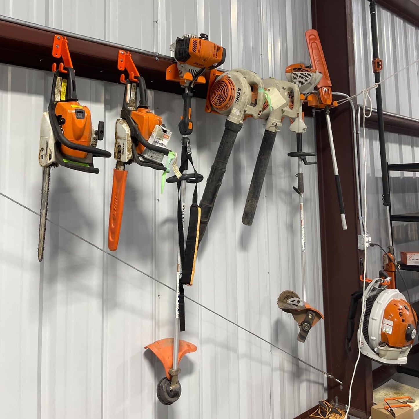 3-in-1 Chainsaw Holder 10in - Heavy Duty Chainsaw Wall Mount, 10 Gauge Steel Chain Saw Hanger for Garage Organization, Hefty Rack Storage Organizer for Chainsaw Accessories and Tools, 180 Lbs Capacity