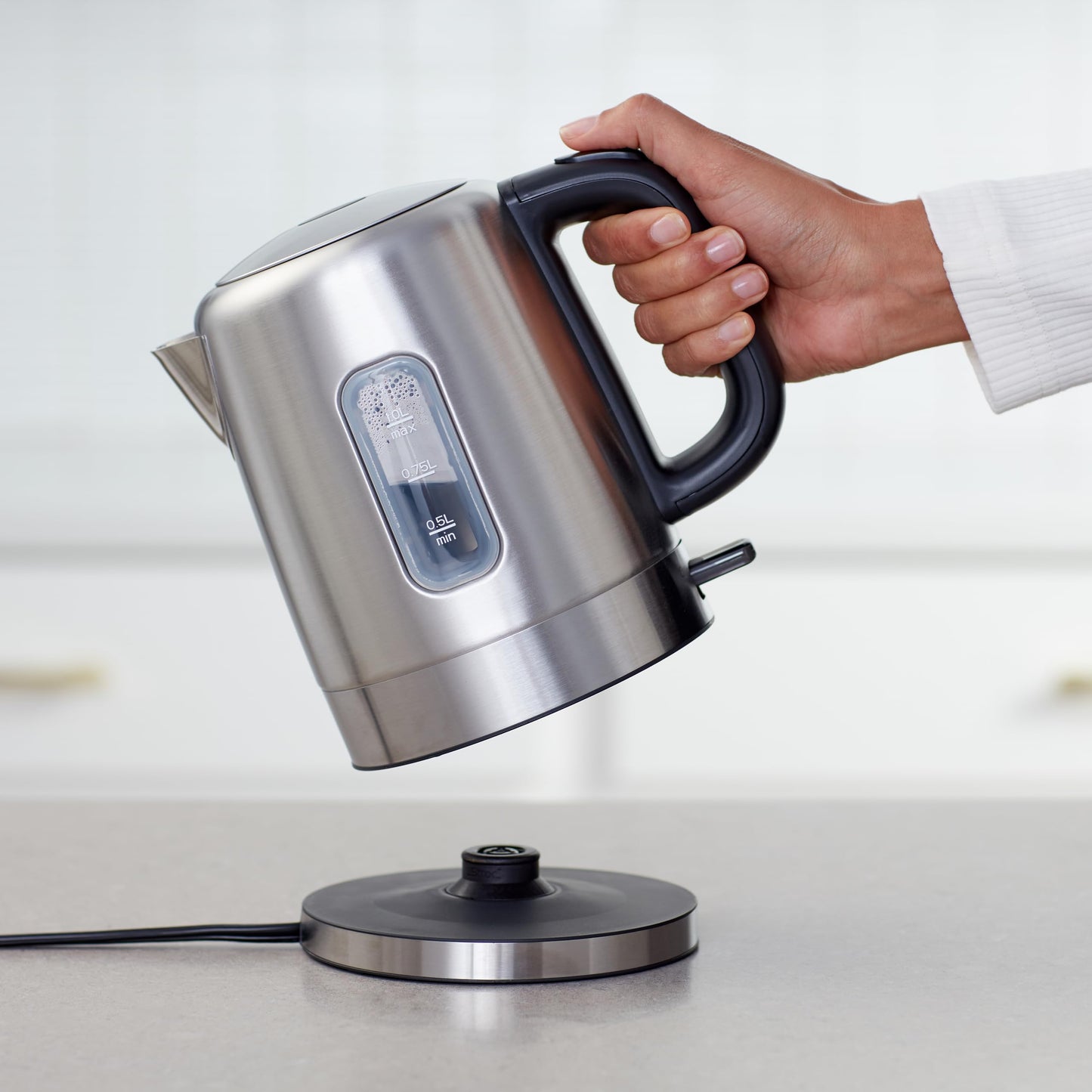 Amazon Basics 1.1-Qt (1.0L) Electric Kettle, Electric Tea Kettle & Water Boiler, With Auto Shut-Off, Boil Dry Protection, High-Safety Strix Thermostat, BPA-Free, 1500W, Stainless Steel, Black & Silver