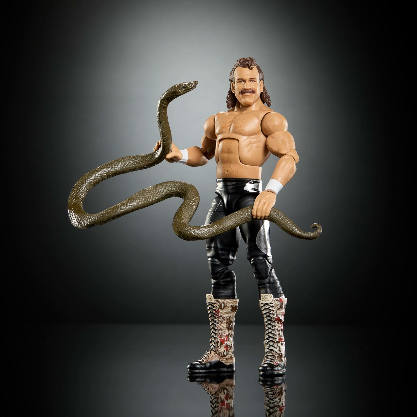 Mattel WWE Elite Collection Action Figure & Accessories, Premium Live Event Jake “The Snake” Roberts Set, Wrestlemania with Sam Roberts Build-A-Figure Parts