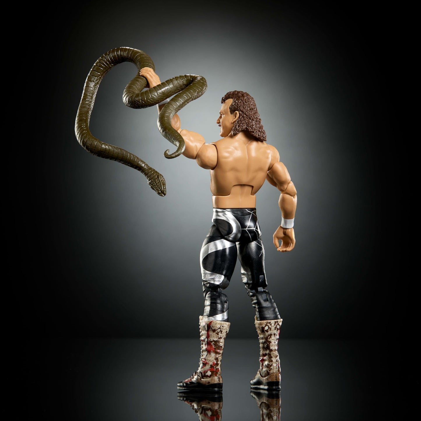 Mattel WWE Elite Collection Action Figure & Accessories, Premium Live Event Jake “The Snake” Roberts Set, Wrestlemania with Sam Roberts Build-A-Figure Parts