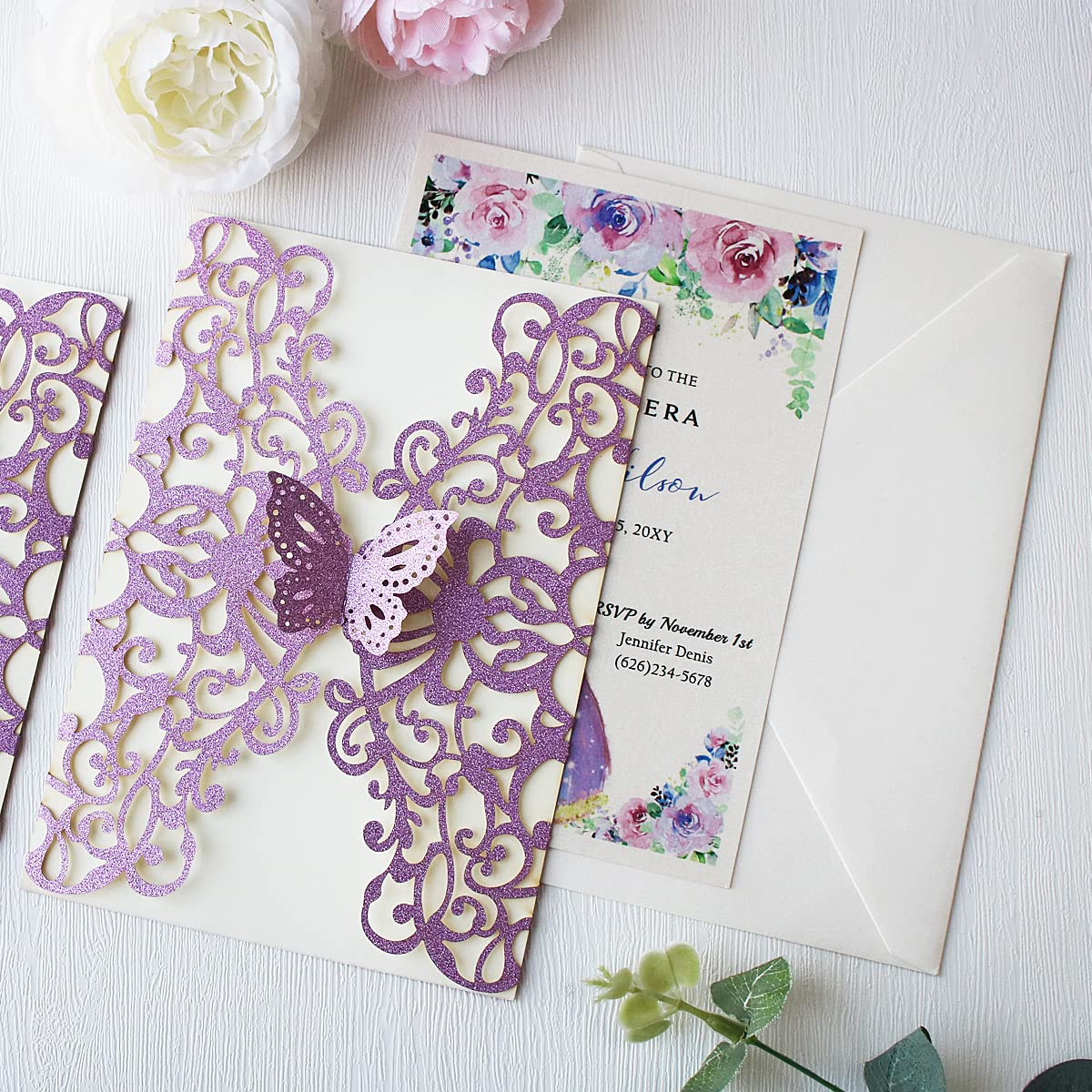 KUCHYNEE 50PCS 5.1 x7.3 Inch Purple Glitter Laser Cut Quinceanera invitations kit Hollow Floral Butterfly Pocket Invitation for Quincenera Wedding Invite (Purple Glitter)