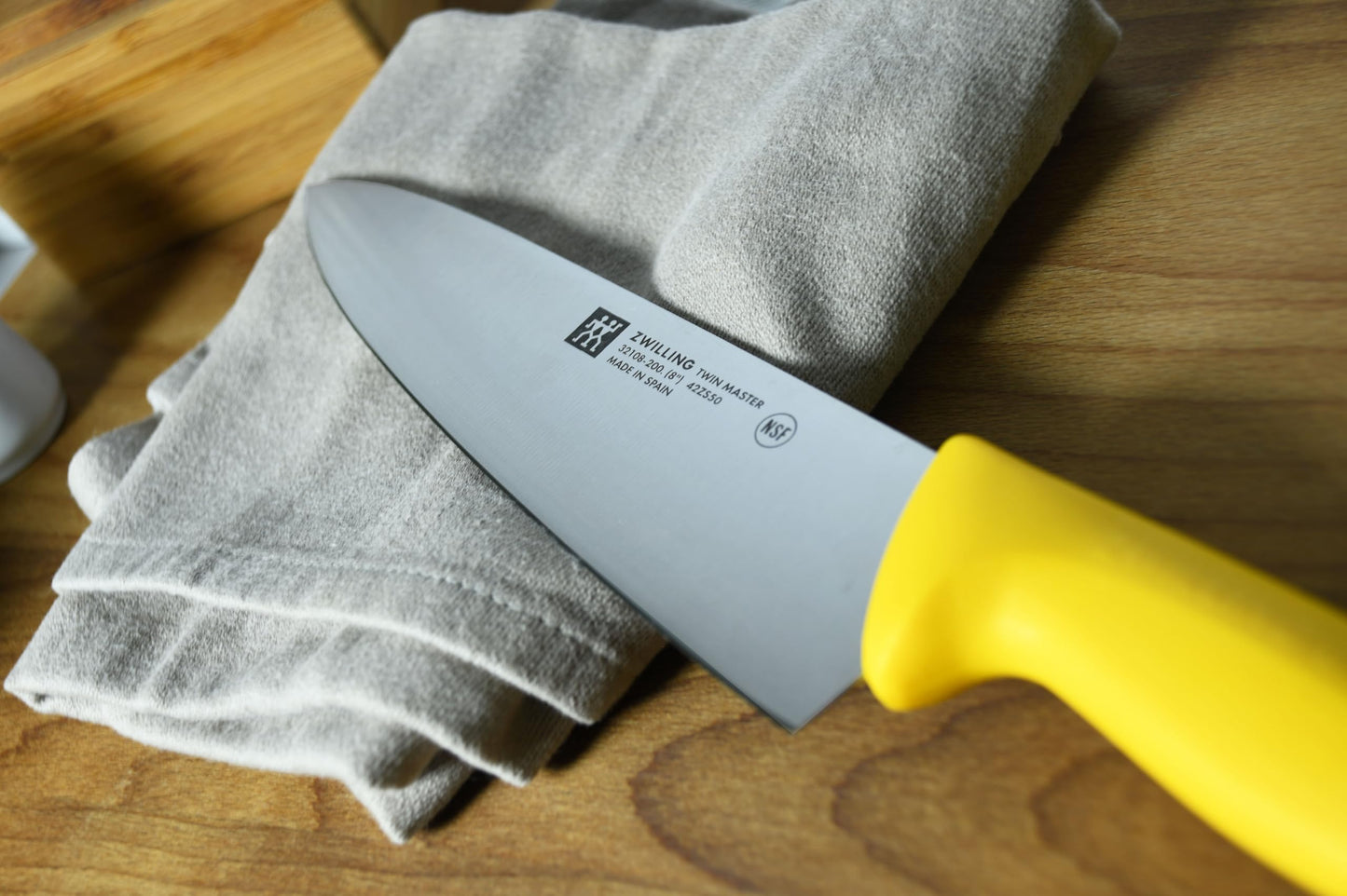 ZWILLING J.A. Henckels Twin Master 8" Chef's Knife | 57 Rockwell Hardness | Ergonomic Non-Slip Synthetic Resin Yellow Handles with Enclosed Tang | Made in Spain