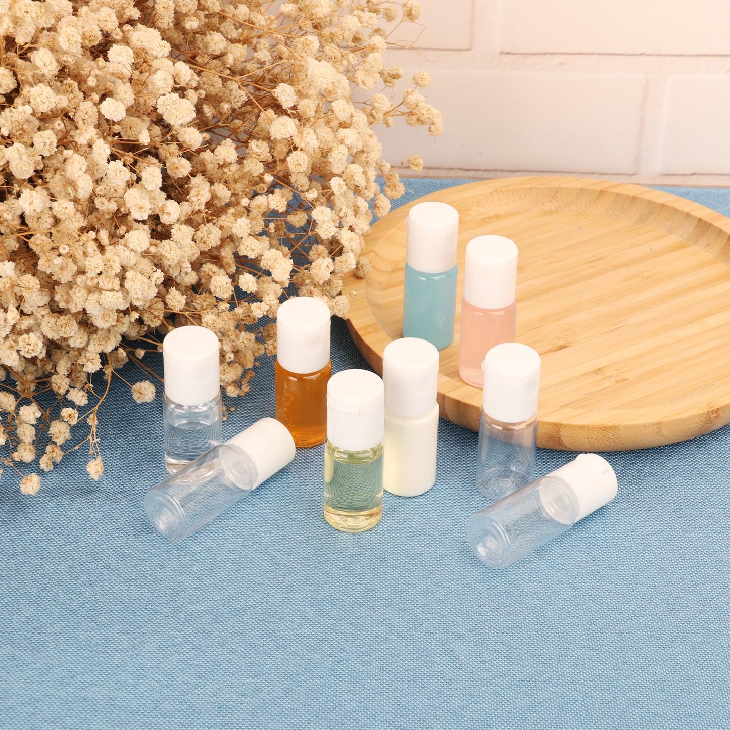 KUKLIPJIM 200 Pack 0.35 oz Plastic Bottles with Top Caps, Clear Empty 10 ml Flip Top Cosmetic Bottles for Lotion and Shampoo, Travel-Friendly, BPA-Free