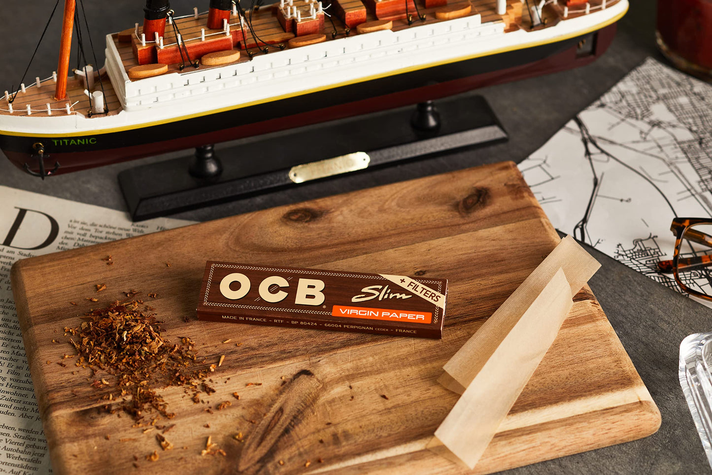 OCB Virgin Unbleached Rolling Papers Slim + Filters (44mm x 109mm) - 32 packs of 32 papers + 32 filters