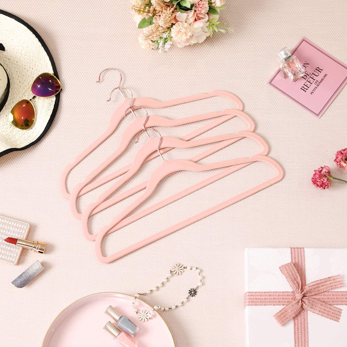 SONGMICS Velvet Hangers, Non-Slip Hanger, Rose Gold Color Swivel Hook, 50-Pack, Pink UCRF026P02