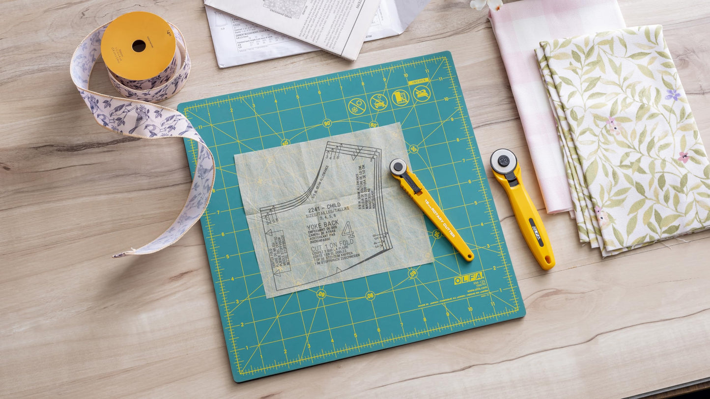 OLFA 12" x 12" Rotating Cutting Mat (RM-12S-01) - Self Healing 12x12 Inch Square Rotary Mat with Grid for Fabric, Sewing, Quilting, & Crafts, Rotates 360 Degrees, Use with Rotary Cutters (Green)