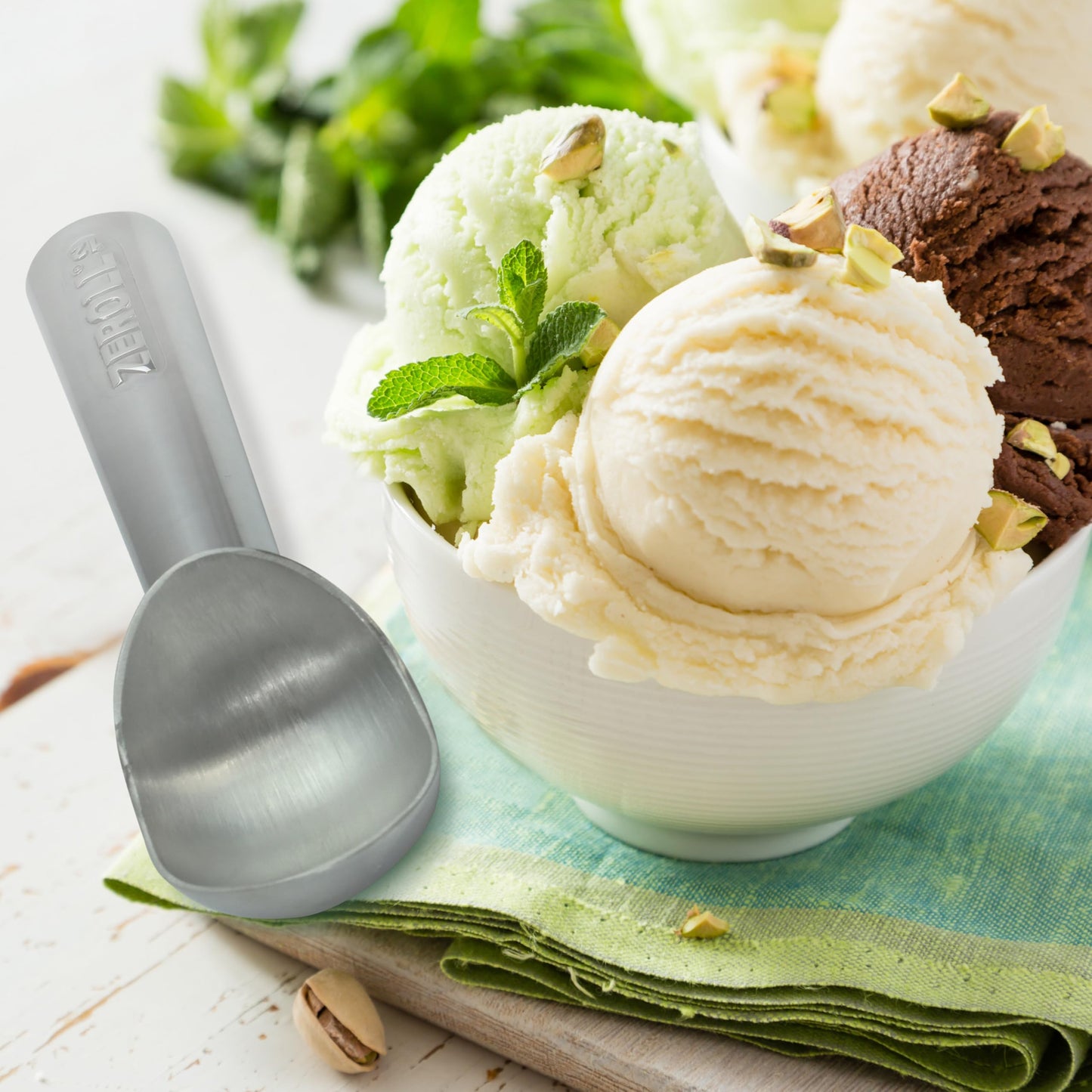Zeroll 1012 Original Ice Cream Easy Scoop with Unique Liquid Filled Heat Conductive Handle Simple One Piece Aluminum Design Easy Release 24 Scoops per Gallon Made in USA, 3-Ounce, Silver