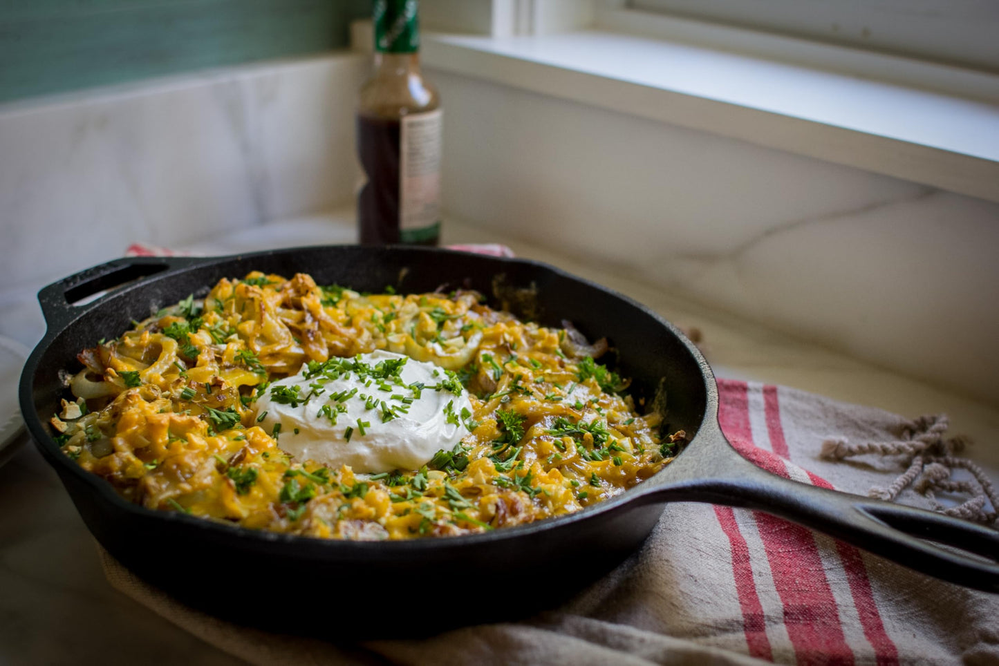 Lodge Cast Iron Skillet, Pre-Seasoned and Ready for Stove Top or Oven Use, 10.25", Black