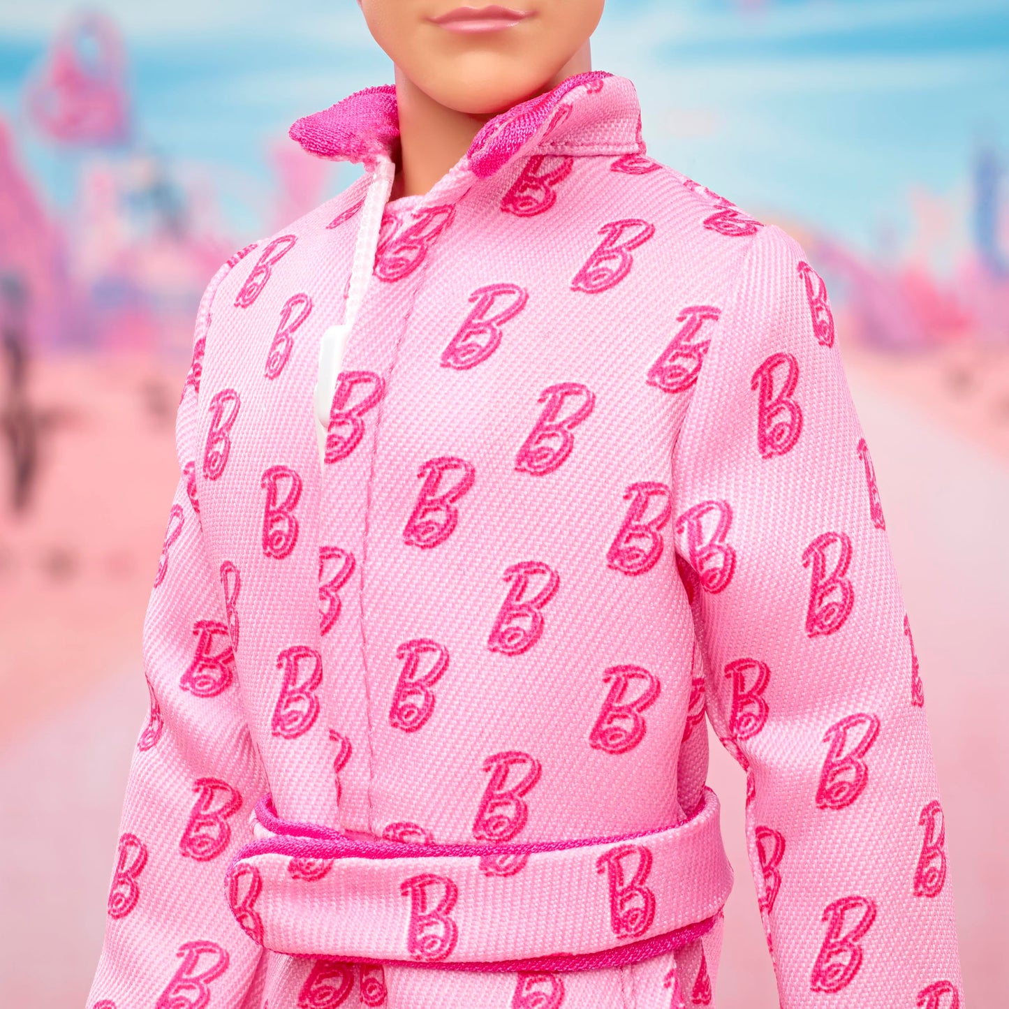 Barbie The Movie Ken Collectible Doll, Ryan Gosling as Ken Wearing Pink Jumpsuit with “B” Detail with White Sneakers and Multicolor Roller Skates