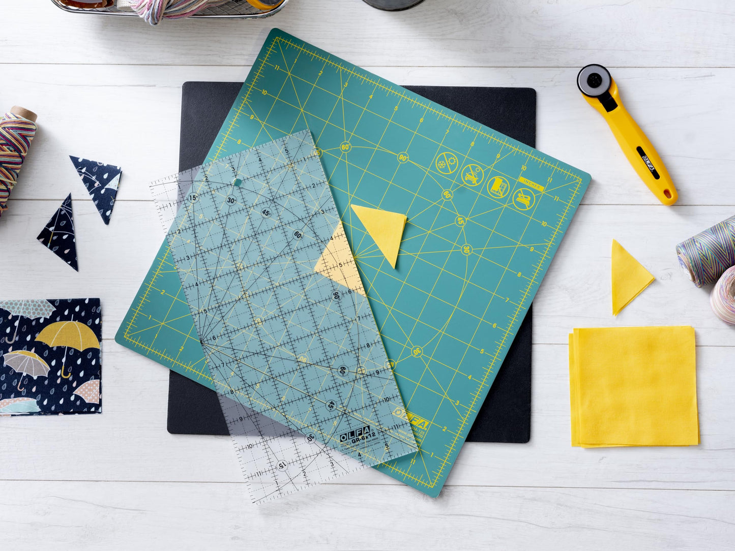 OLFA 12" x 12" Rotating Cutting Mat (RM-12S-01) - Self Healing 12x12 Inch Square Rotary Mat with Grid for Fabric, Sewing, Quilting, & Crafts, Rotates 360 Degrees, Use with Rotary Cutters (Green)