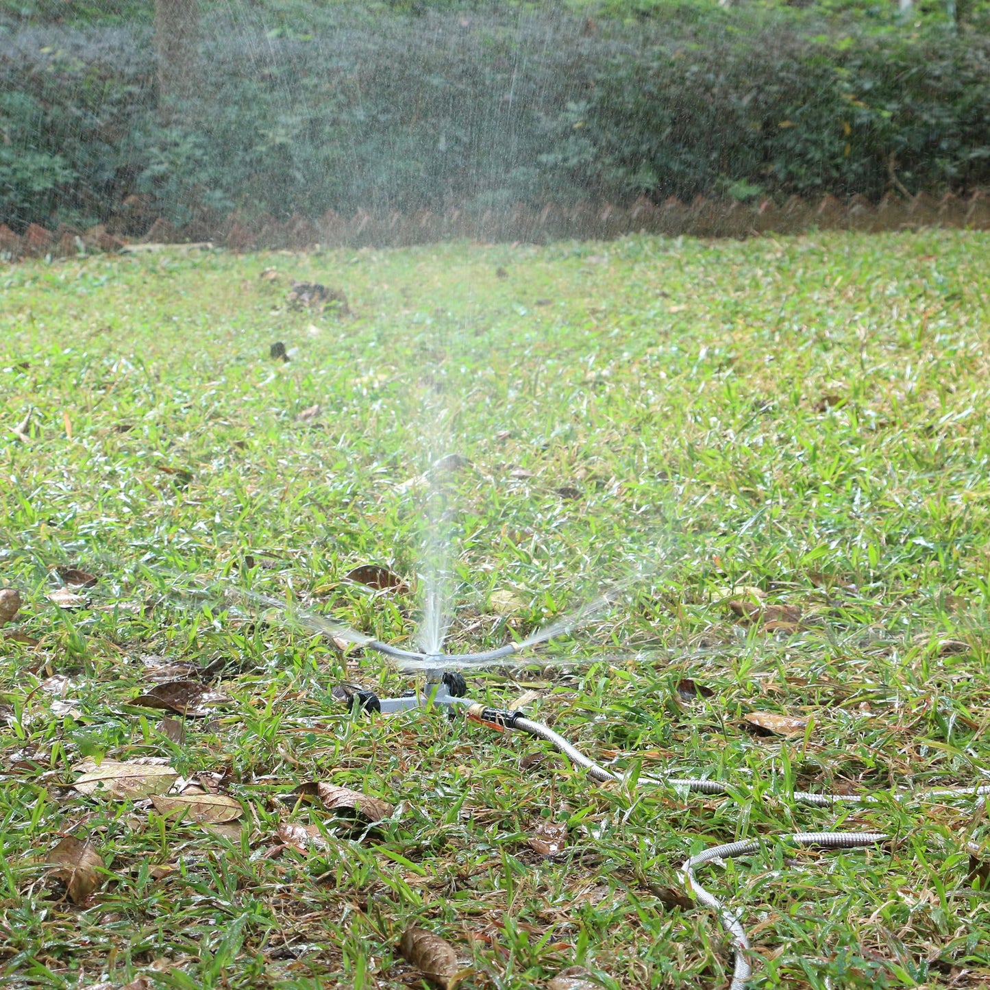 STYDDI Metal Rotating Water Sprinkler for Lawn, Heavy Duty Metal 3-Arms Whirling 360 Degree Automatic Rotary Lawn Sprinkler with Wheeled Base for Small Lawn and Garden, Yard, Cover up to 1,384 Sq. ft.